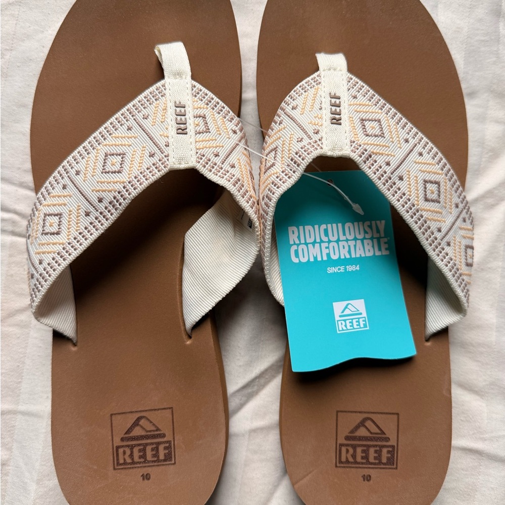 Reef women’s sandals. Size 10 but fits more like a size 9 or 9.5. Cream. New.